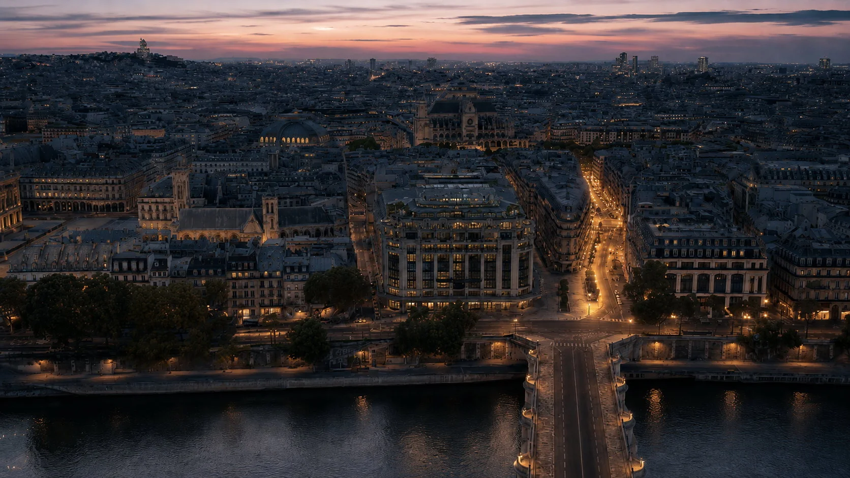 Aerial view of Paris at dusk over the Seine and Pont Neuf, streets glowing gold